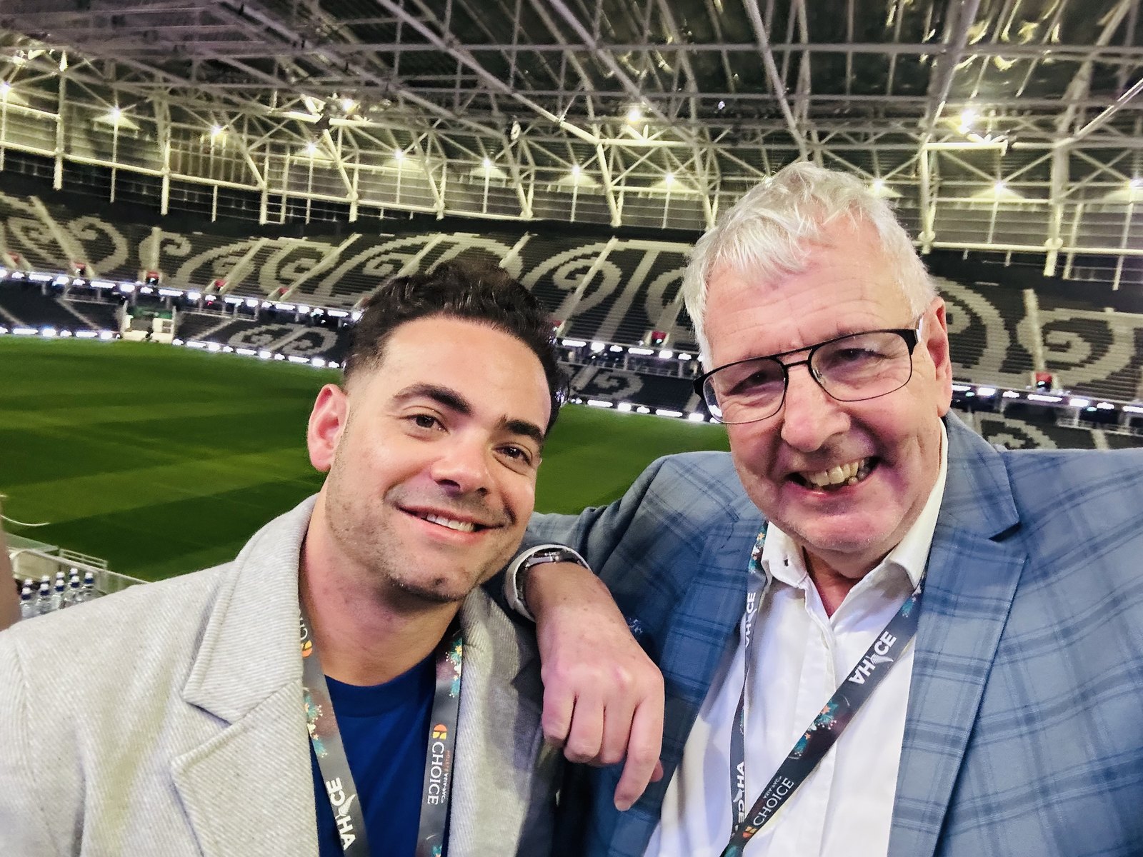 Bernard Burke with a fellow AHICE attendee inside One New Zealand Stadium in Christchurch