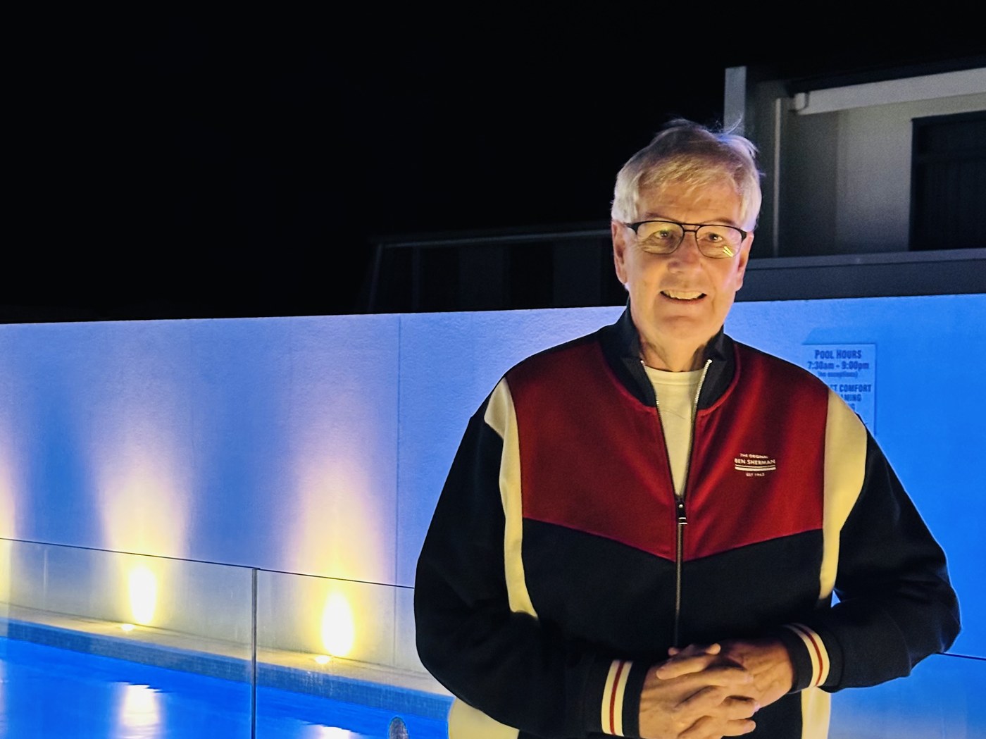 Bernard Burke at a New Zealand accommodation property pool area