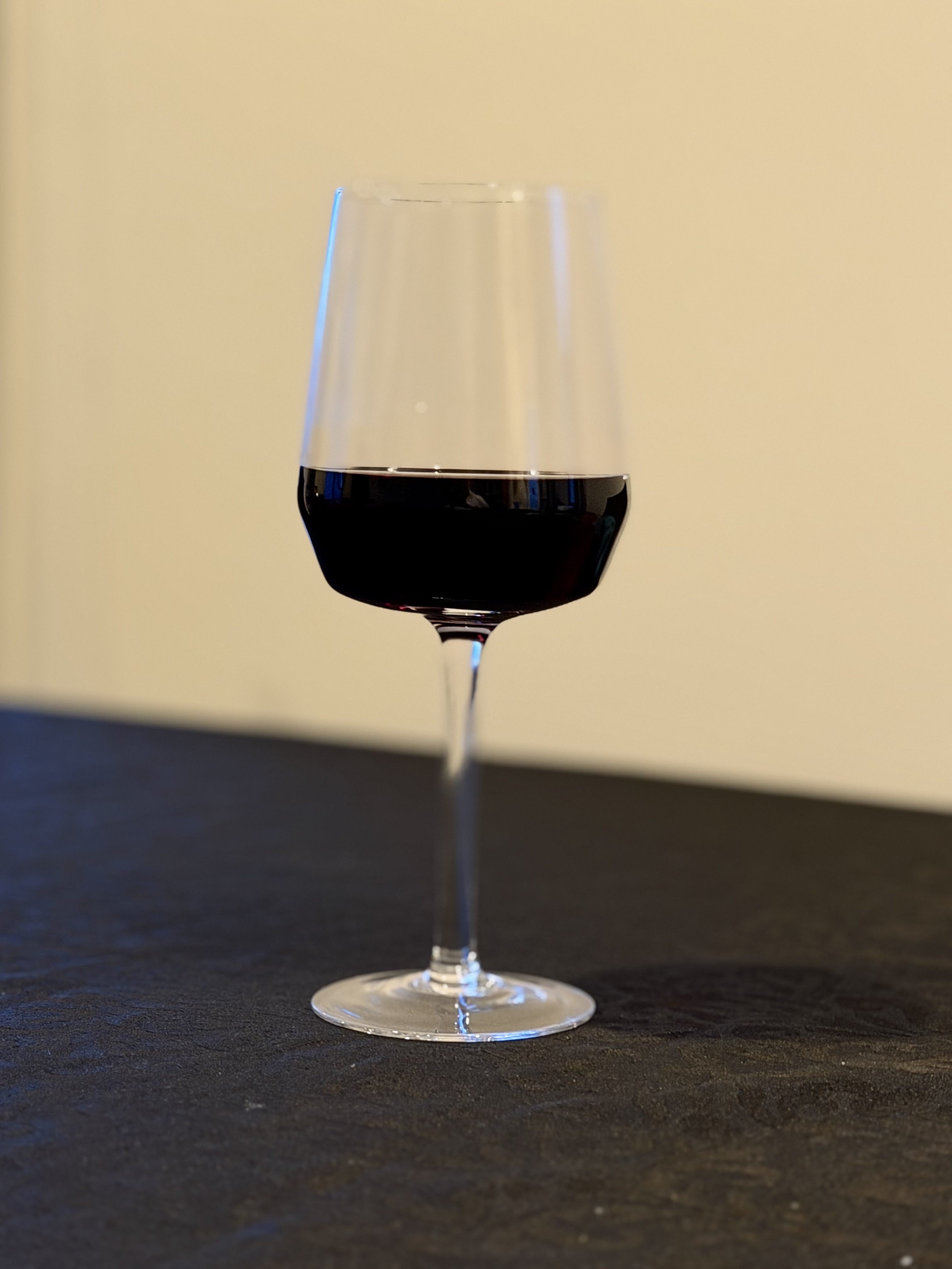 A glass of red wine illustrating HospoGuy's carpet stain removal advice.